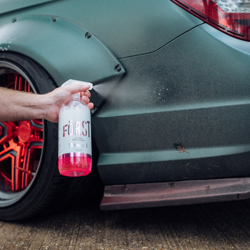 Först being sprayed onto a a rear car panel
