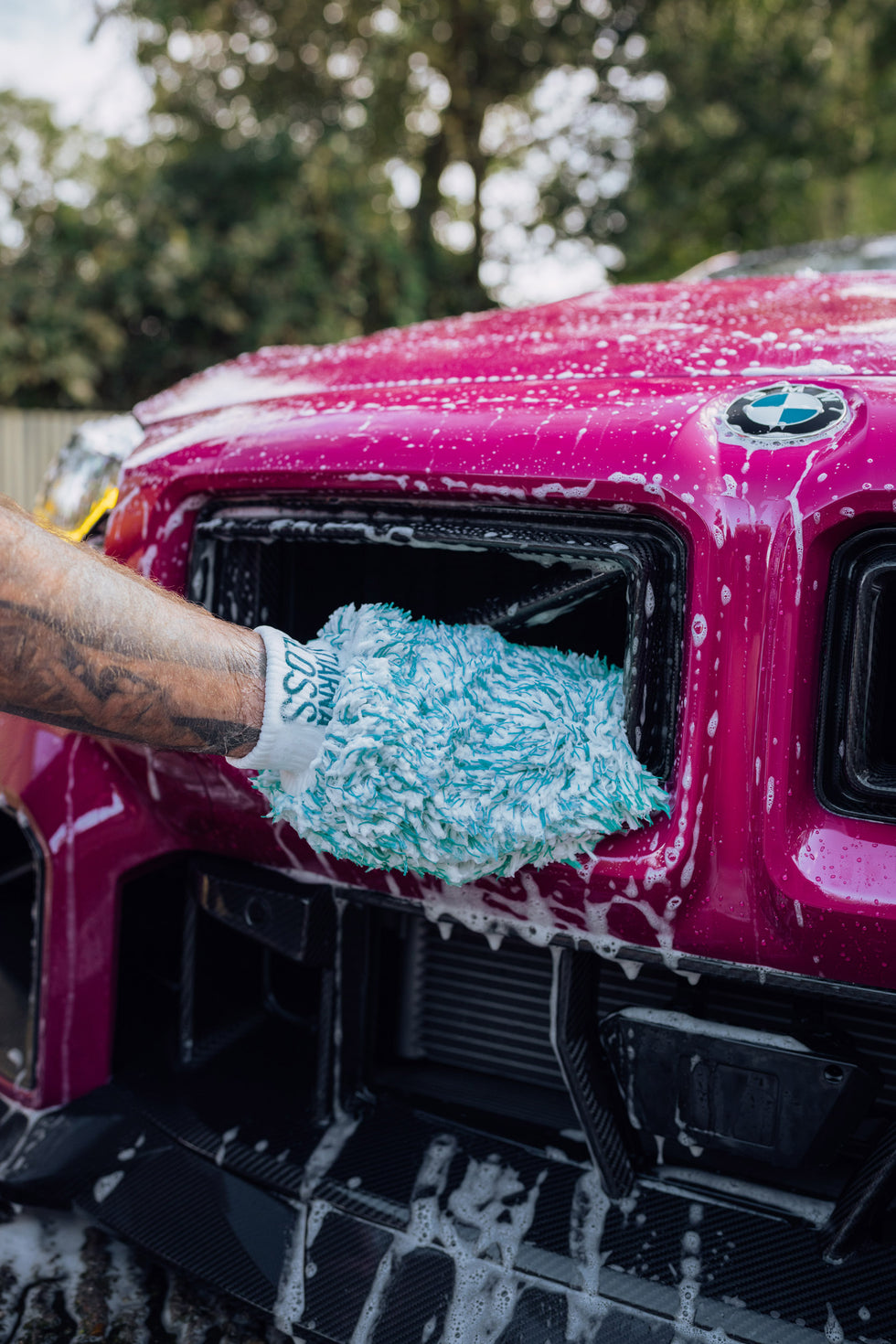 Cleaning front of BMW